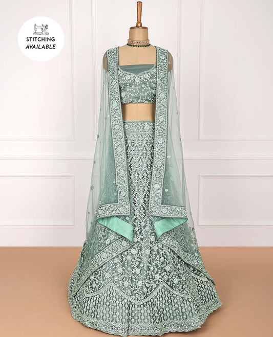 Green net lehenga with jaal & floral embroidered skirt, floral vine embroidered top & embroidered border net dupatta