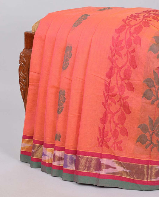 Pink kanchi cotton saree with buttas, contrast ikkat border & pallu of floral designs