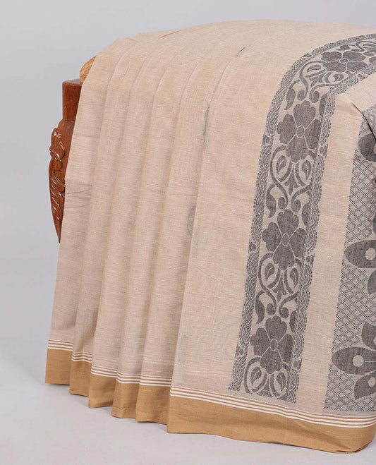 Beige kanchi cotton saree with buttas, contrast plain border & pallu of intricate designs