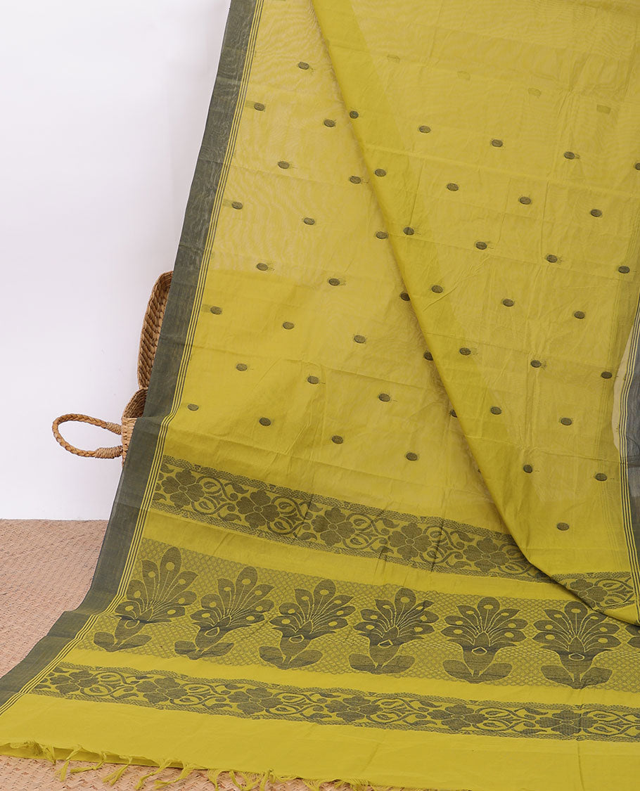 Green buttas kanchi cotton saree, contrast border & pallu of floral design