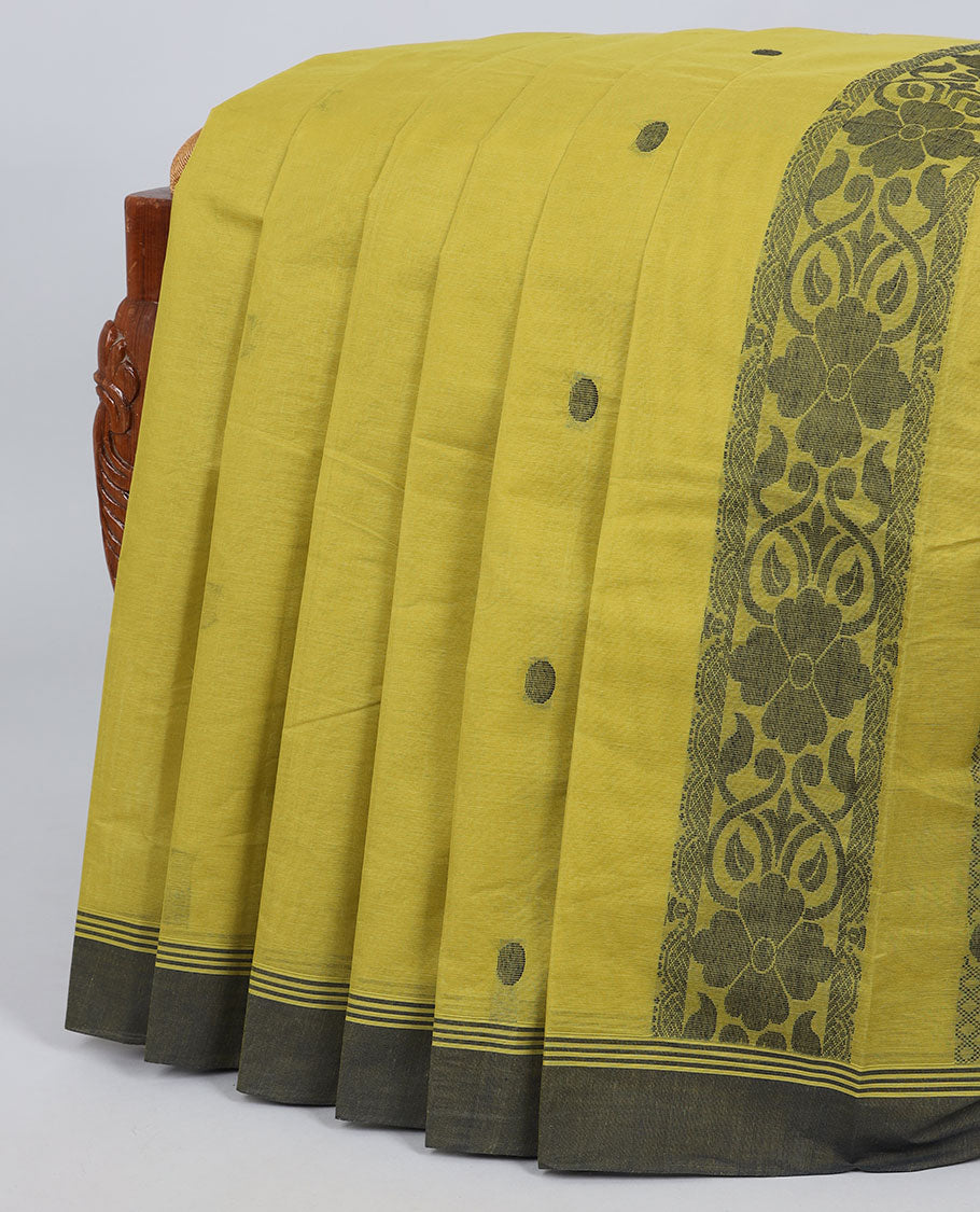 Green buttas kanchi cotton saree, contrast border & pallu of floral design