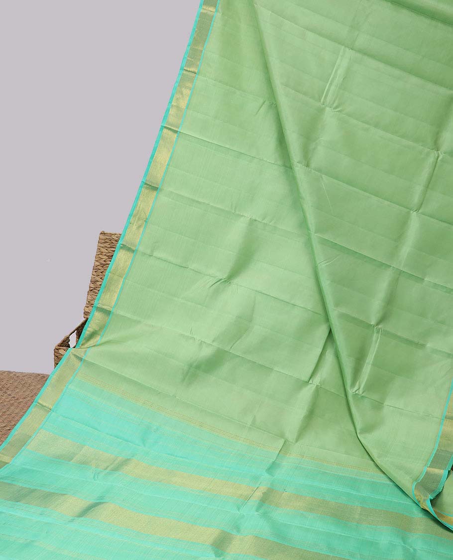 Green plain kancheepuram silksaree, contrast zari border of kathir & zari stripes & pallu of zari designs