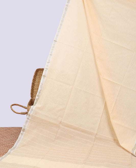 Pastel orange plain jute cotton saree, zari border & striped pallu