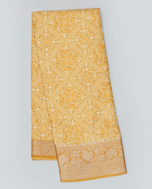 Yellow intricately printed semi-banaras dola saree, traditional zari border