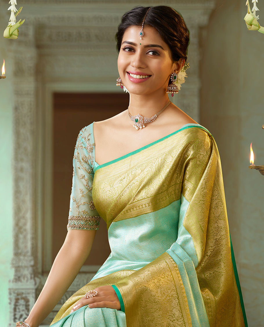 Blue jacquard silk saree, contrast intricate pallu & border of muthu,kathir,poun,neli,kuyil kann,yaanai,mayil & yaali