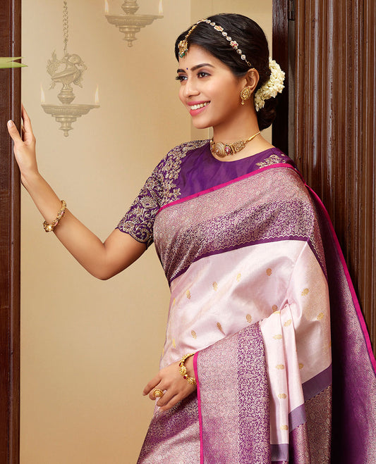 Pink silk saree with zari buttas, contrast zari border pallu features intricately woven floral vine designs