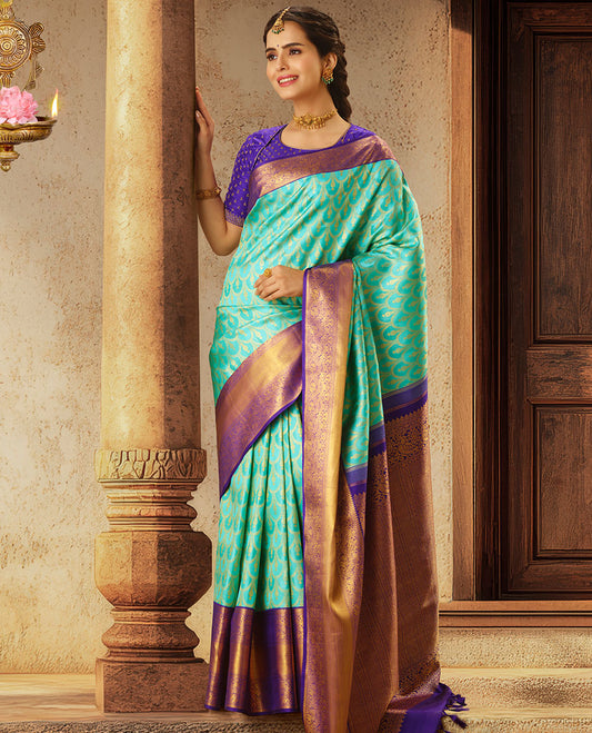 Turquoise jacquard silk saree, contrast intricately woven zari pallu & getti zari border of rekku,kathir,manga & mayil