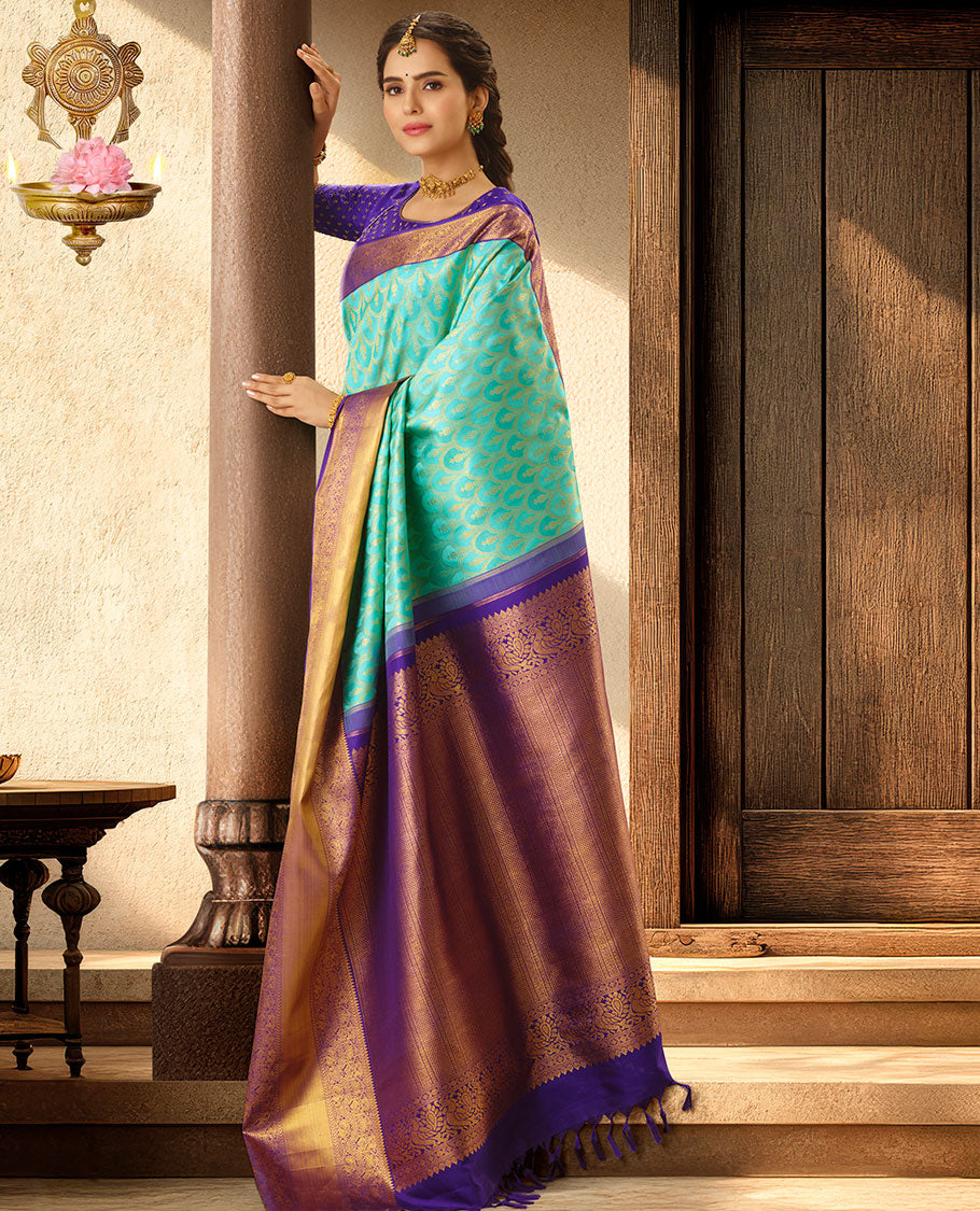 Turquoise jacquard silk saree, contrast intricately woven zari pallu & getti zari border of rekku,kathir,manga & mayil