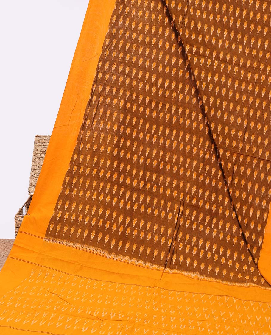 Brown ikkat cotton saree with buttas, contrast border & ikkat design pallu