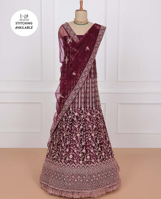 Maroon net lehenga, floral & geometric embroidered skirt, stone embroidered top & embroidered net dupatta