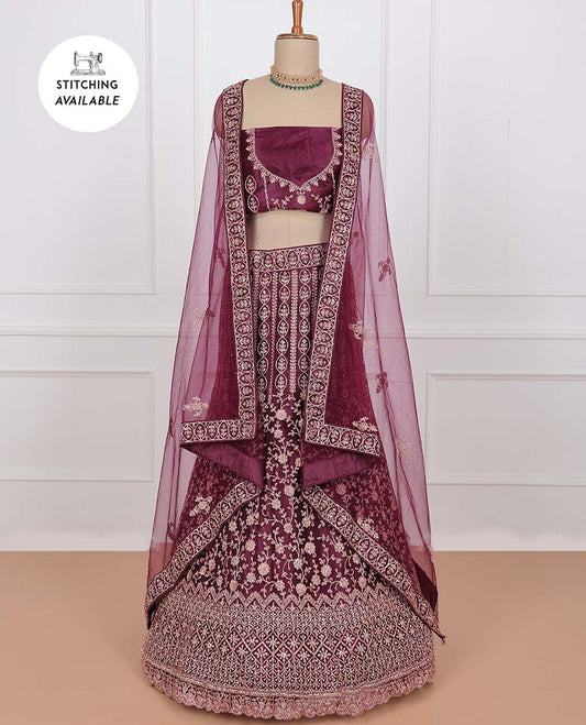 Maroon net lehenga, floral & geometric embroidered skirt, stone embroidered top & embroidered net dupatta