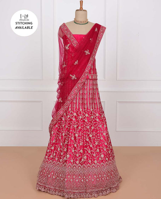 Pink net lehenga, floral & geometric embroidered skirt, stone embroidered top & embroidered net dupatta