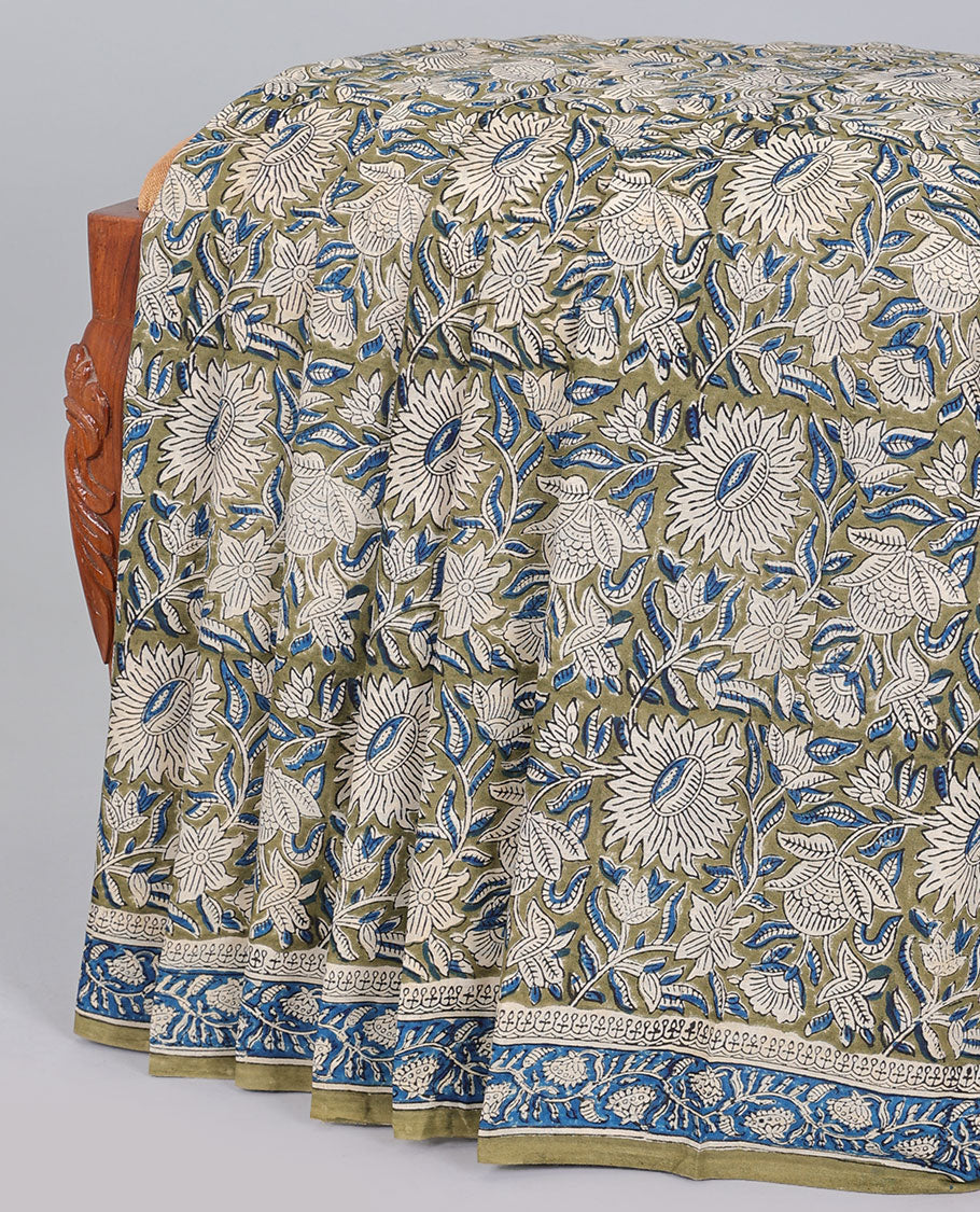 Green floral printed mul-mul cotton saree, floral border & pallu of floral & geometric print