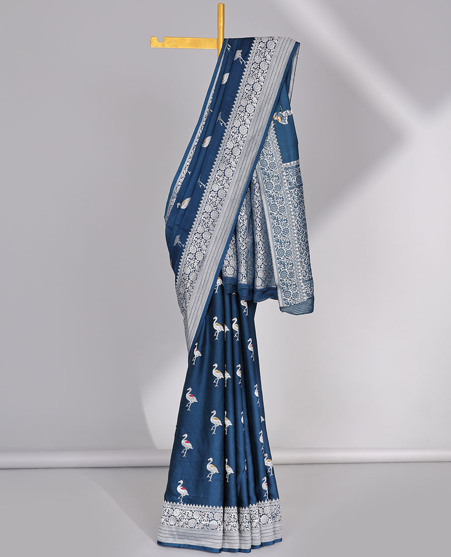 Blue mushru silk saree with swan motifs, traditional design border & intricate pallu