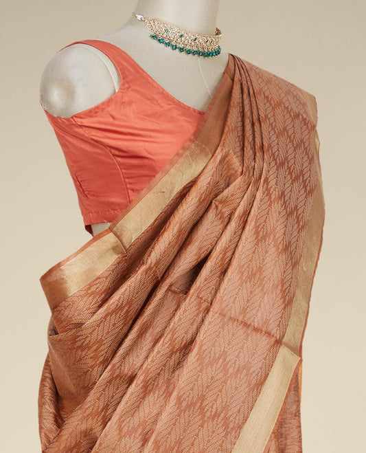 Brown sparely designed intricate tusser silk saree, plain border
