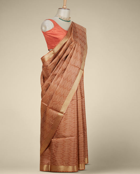 Brown sparely designed intricate tusser silk saree, plain border