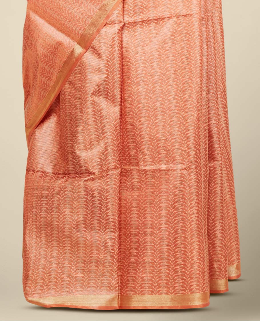 Orange intricately designed tusser silk saree, plain border