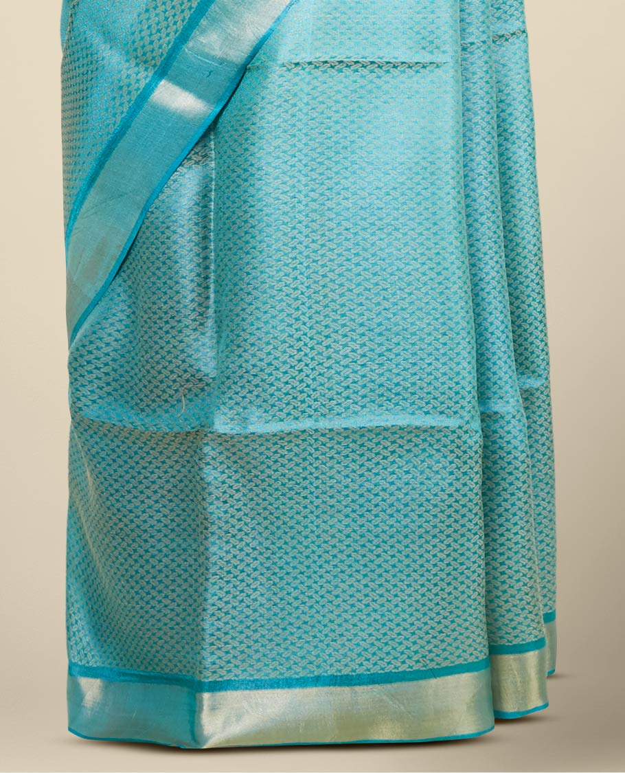 Green intricately designed tusser silk saree, plain border