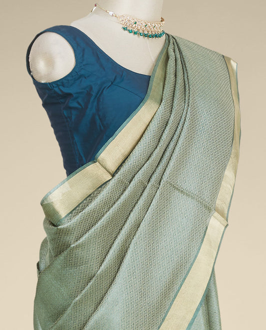 Green intricate jaal-style designed tusser silk saree, plain border