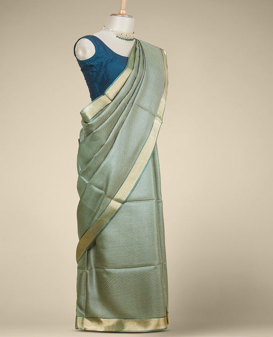 Green intricate jaal-style designed tusser silk saree, plain border