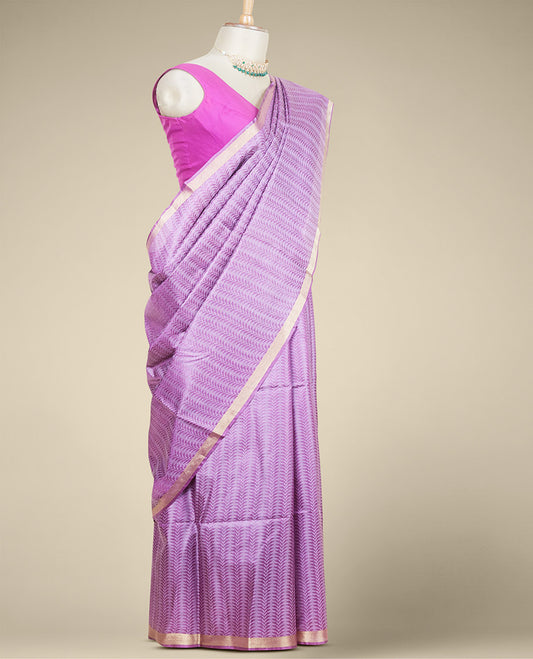 Purple intricately designed tusser silk saree, plain border