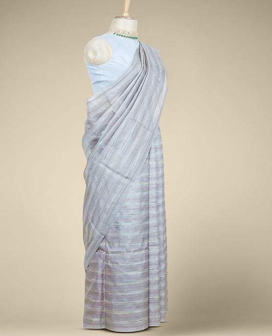 Borderless grey tusser silk saree steeped with stripes & micro-sized triangle motifs