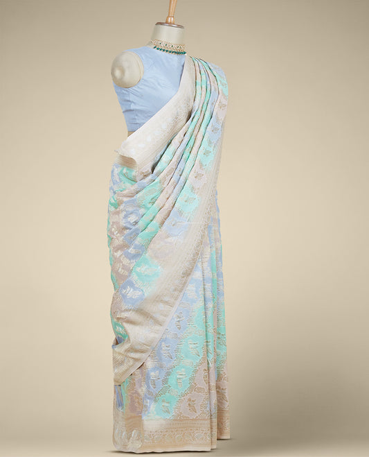 Multi-color banaras-style rangkat floral jacquard fancy crepe saree, contrast border of traditional designs