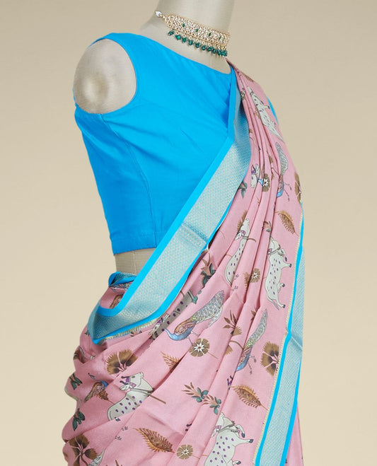 Pink printed mysore silk saree features peacock, floral & pichwai cow motifs, contrast zari border