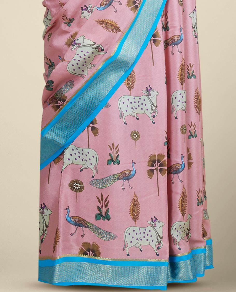 Pink printed mysore silk saree features peacock, floral & pichwai cow motifs, contrast zari border