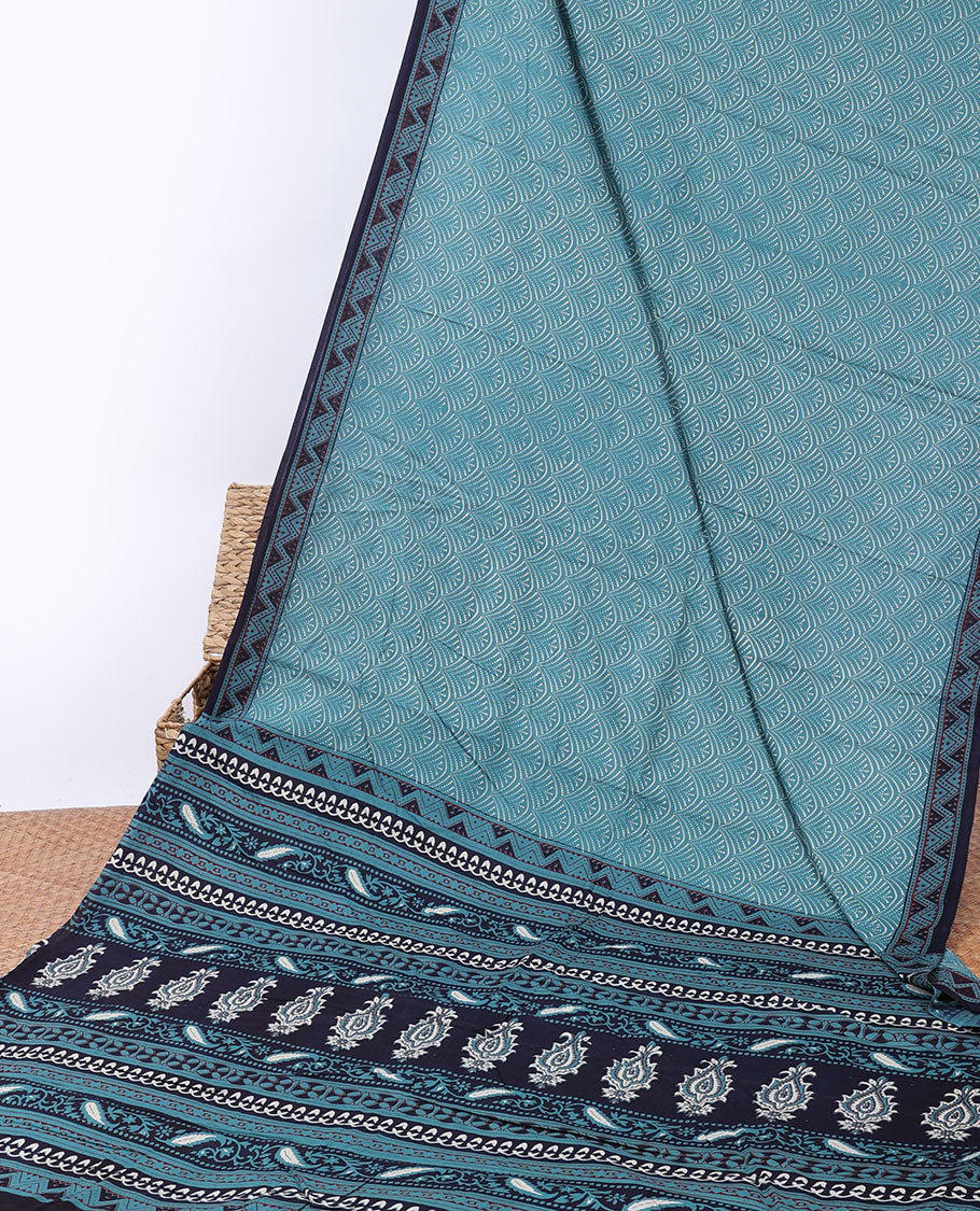 Blue scallop printed mul-mul cotton saree, contrast chevron printed border & pallu of intricate print 
