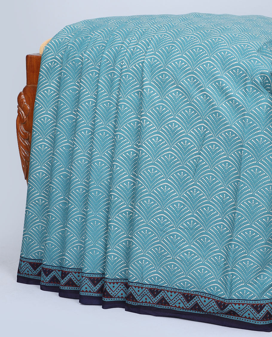 Blue scallop printed mul-mul cotton saree, contrast chevron printed border & pallu of intricate print 
