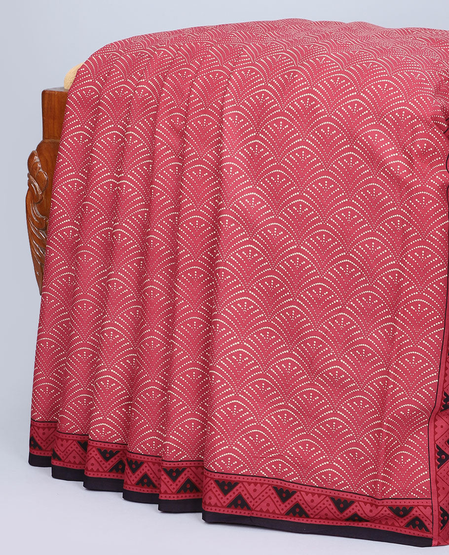 Red scallop printed mul-mul cotton saree, contrast chevron printed border & pallu of intricate print 