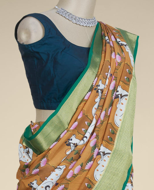 Mustard pichwai cows & lotus motifs printed mysore silk saree, contrast traditional design border