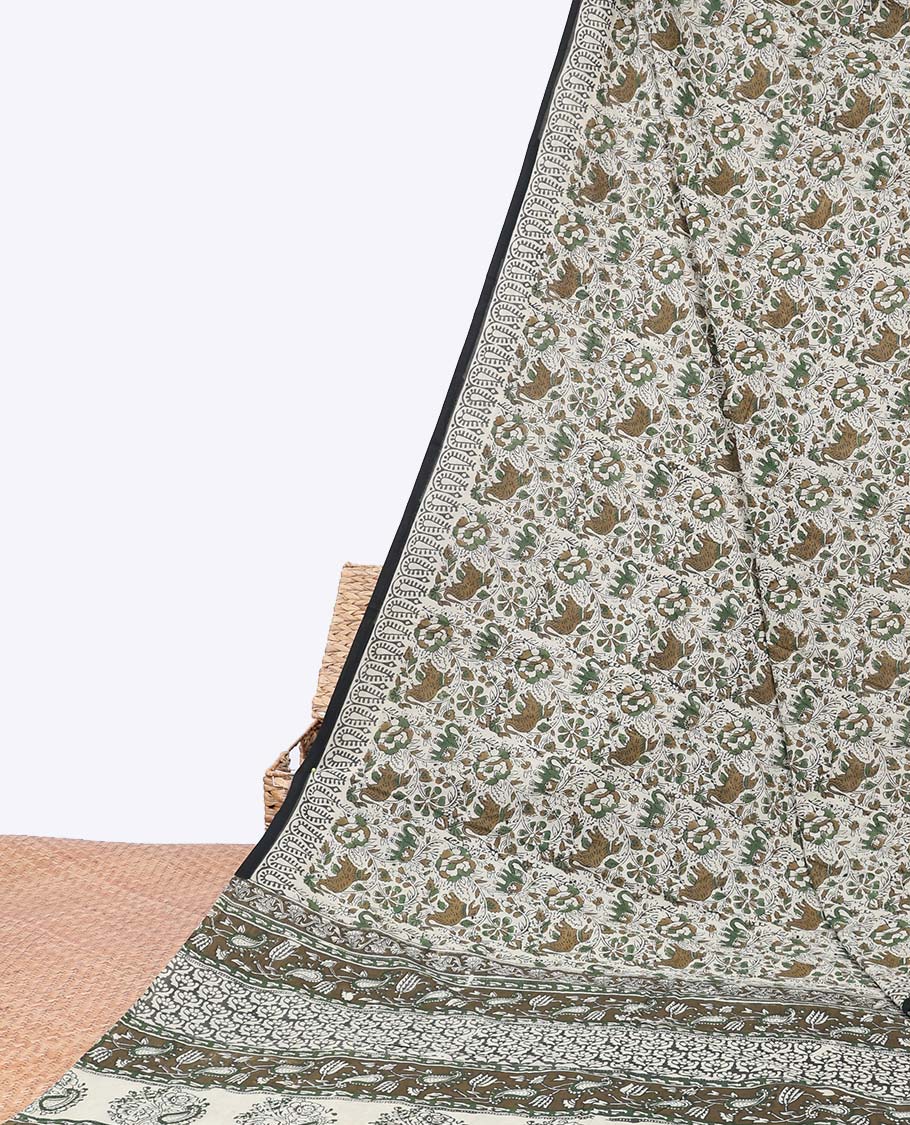Multi-color flora & fauna printed mul-mul cotton saree, printed border & paisley printed pallu