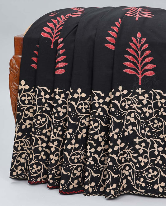 Black linen cotton saree with buttas, floral vine printed border & pallu of geometric & floral print 
