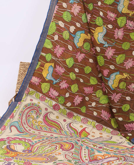 Brown pichwai lotus hand-painted pen kalamkari silksaree, contrast traditional border & kaleidoscopic-colored pallu