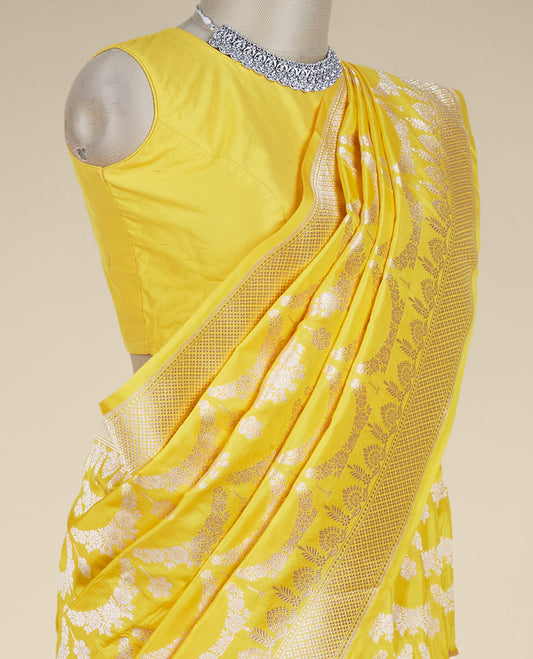 Yellow jacquard design pure banaras silk saree, zari-rich border of intricate design weave