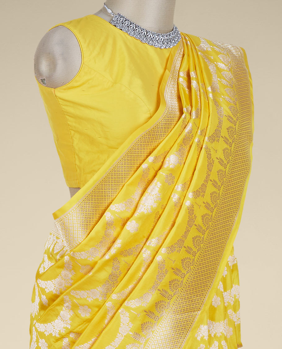 Yellow jacquard design pure banaras silk saree, zari-rich border of intricate design weave