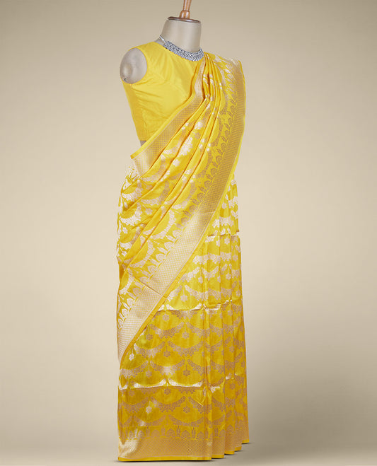 Yellow jacquard design pure banaras silk saree, zari-rich border of intricate design weave