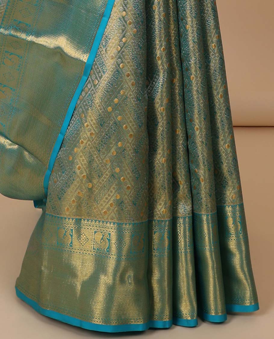 Blue jacquard Kanchipuram tissue silksaree, intricate pallu & border of thilakam mokku,neli,diamond,mayil & vanki