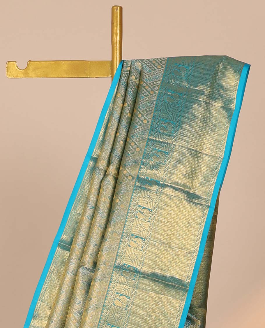 Blue jacquard Kanchipuram tissue silksaree, intricate pallu & border of thilakam mokku,neli,diamond,mayil & vanki