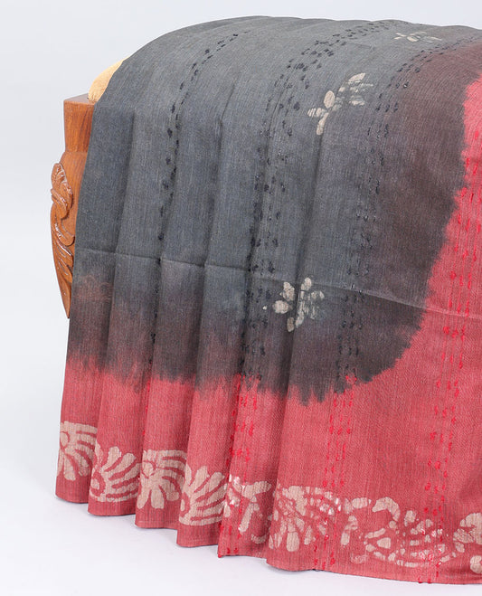 Grey linen cotton saree with batik-style floral buttas, contrast border & pallu of batik printed