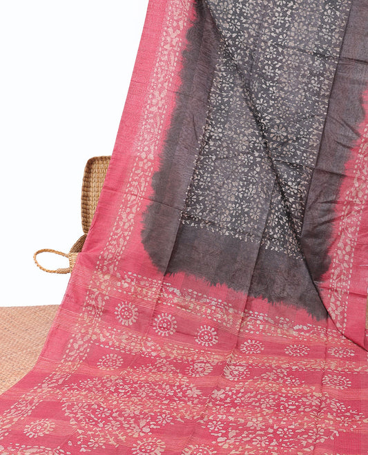 Grey linen cotton saree with batik-style floral vine, contrast border & pallu of batik printed
