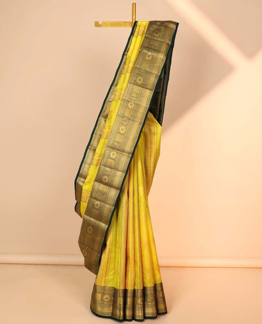 Yellow geometric design silksaree,contrast paiyadi kattam pallu & border of rettai neli,muthu,mayil chakram & kuyil kann
