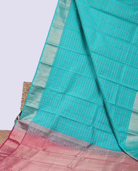 Blue checked silk saree, contrast jaal pallu & border of thilakam mokku,kathir,muthu,mayil chakram