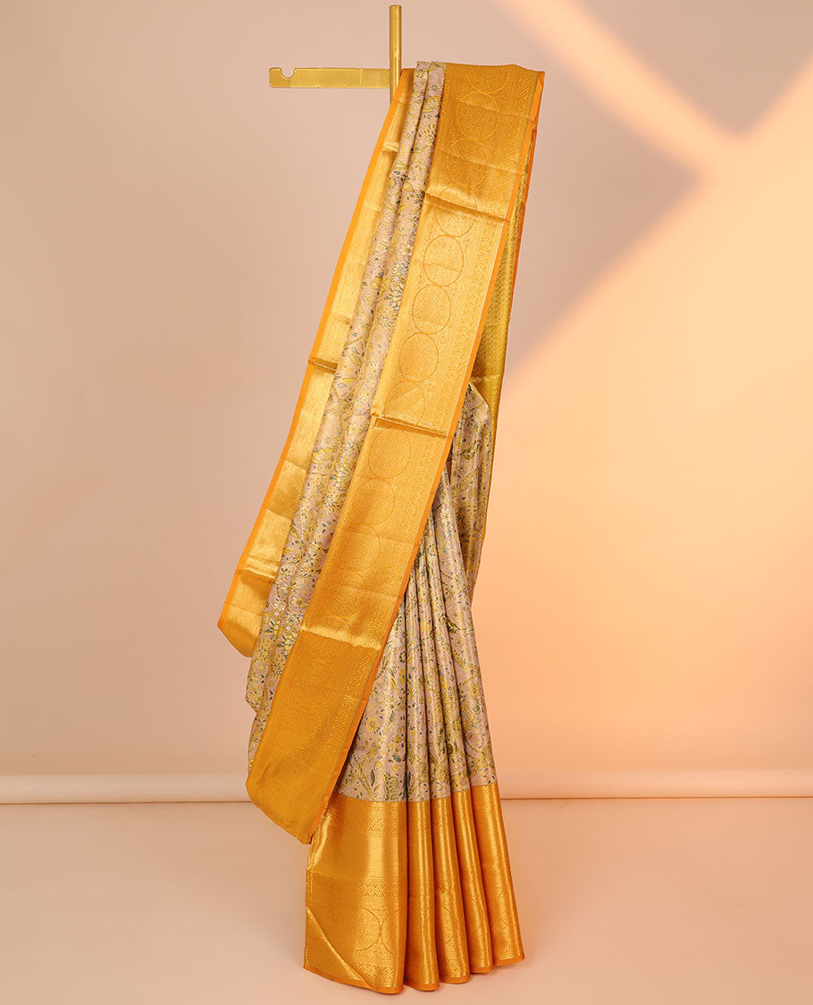 Yellow floral jacquard silk saree, contrast intricate pallu & border of diamond,kathir,mayil kann,jadai nagam & chakram
