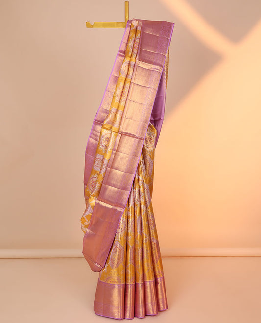 Orange jacquard silk saree, contrast intricate pallu & border of thilakam,muthu,zari stripes & mayil designs