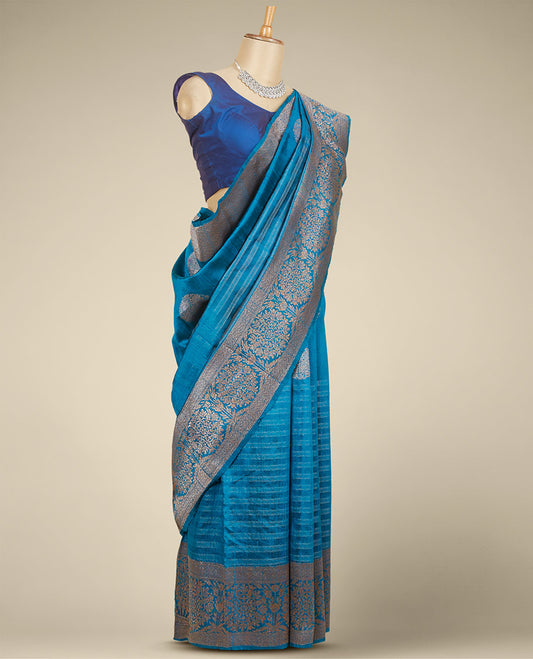 Blue striped dupion silk saree with zari buttas, zari border of floral designs