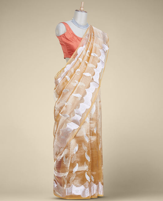 Orange tissue silk saree with paisley buttas, traditional zari border & intricate pallu