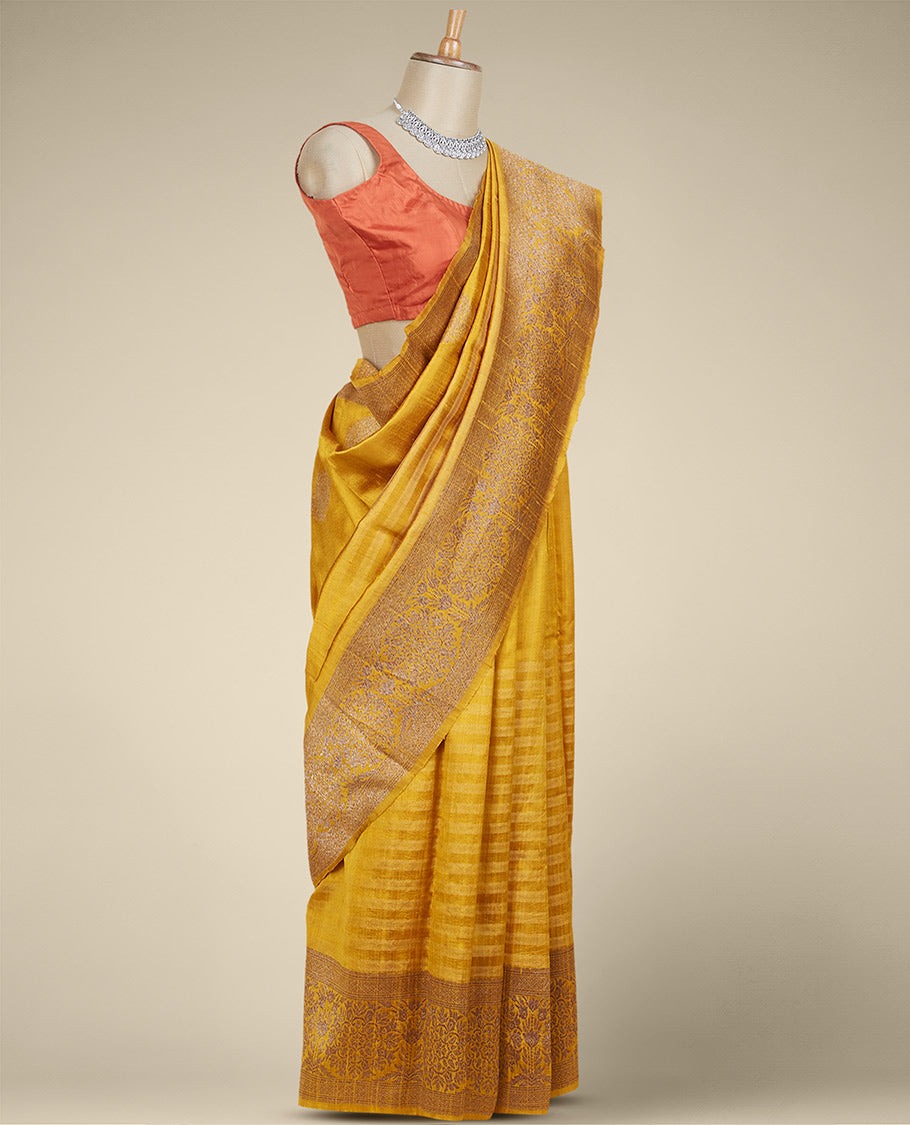Yellow striped dupion silk saree with zari buttas, zari border of floral designs